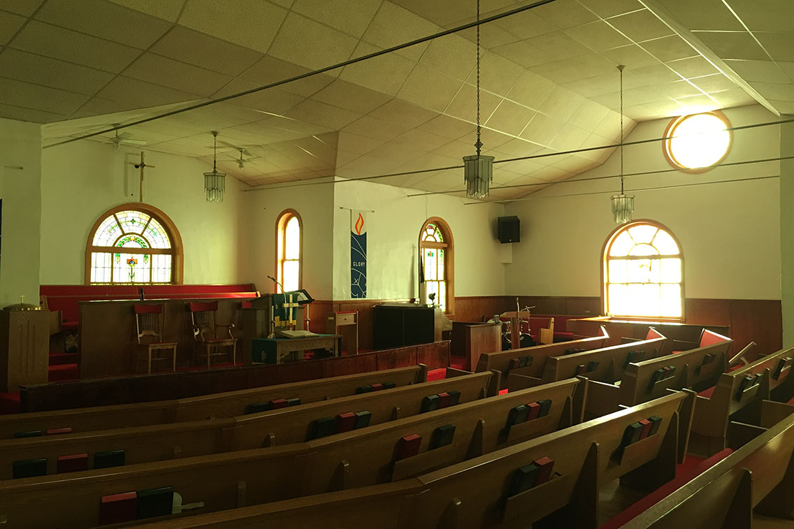 Interior photo of a church sanctuary before it was rehabilitated.