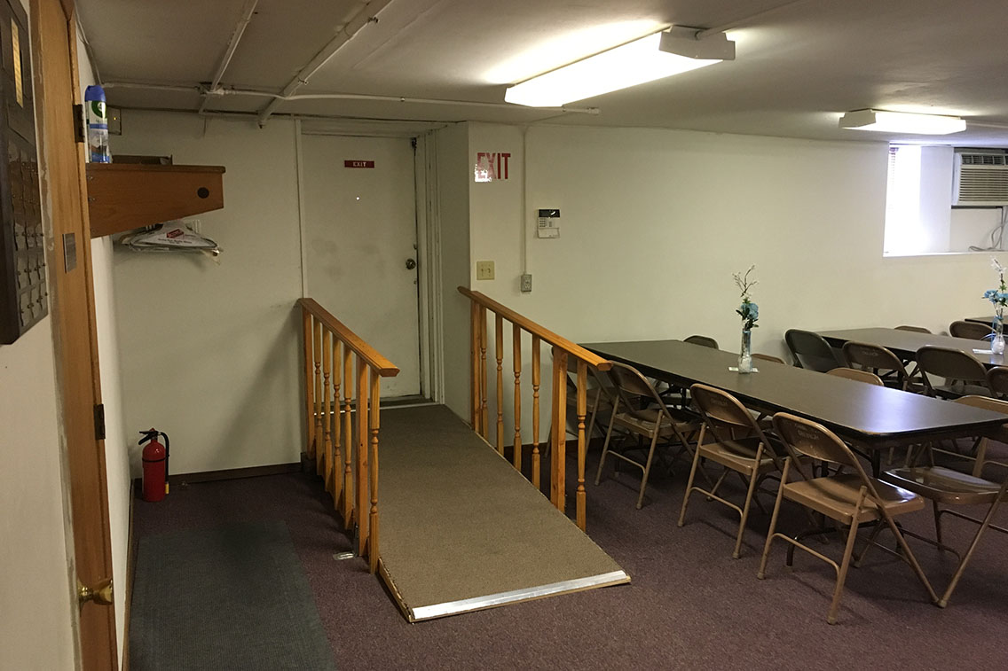 Photo of exit ramp leading out of a church fellowship hall.