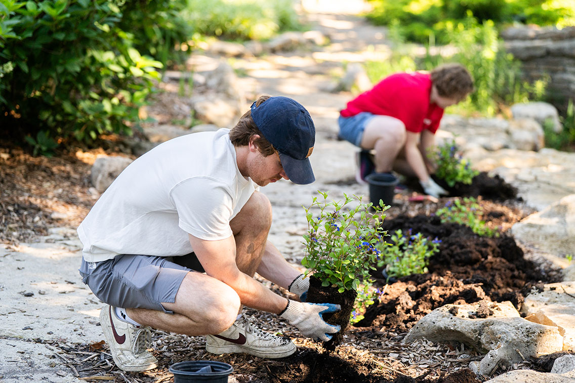 Treanor Topeka architect volunteers at a local park in Kansas.