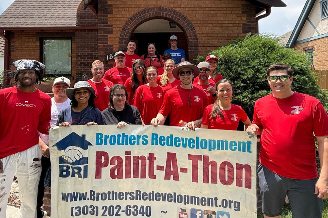 Treanor staff volunteering at their Day of Giving at the Brothers Redevelopment, Inc. Paint-A-Thon in Denver, Colorado