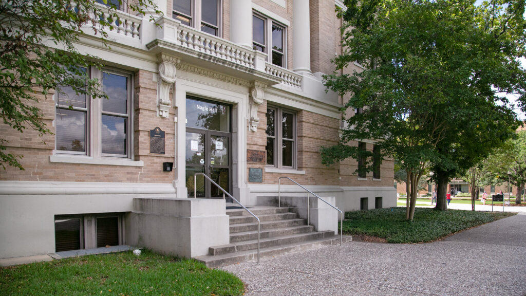 Front entrance of Nagle Hall showing restored Classical Revival details for adaptive reuse at Texas A&M.