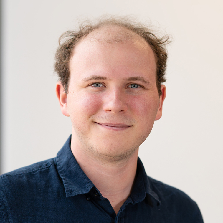 Headshot of Sammy Adcock, Advanced Industries Architectural Designer at Treanor in Denver, Colorado.