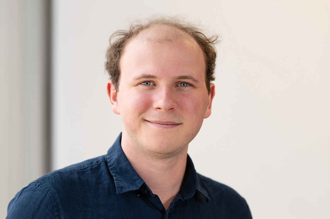 Headshot of Sammy Adcock, Advanced Industries Architectural Designer at Treanor in Denver, Colorado.