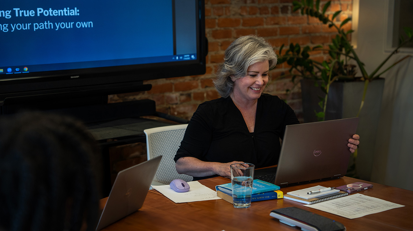 Laura Pastine, Director of Sustainability at Treanor, presents at the firm's Emerging Professionals Development Days program in the summer of 2025.