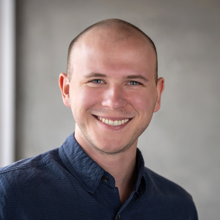 Headshot of Sammy Adcock, Advanced Industries Architectural Designer at Treanor in Denver, Colorado.