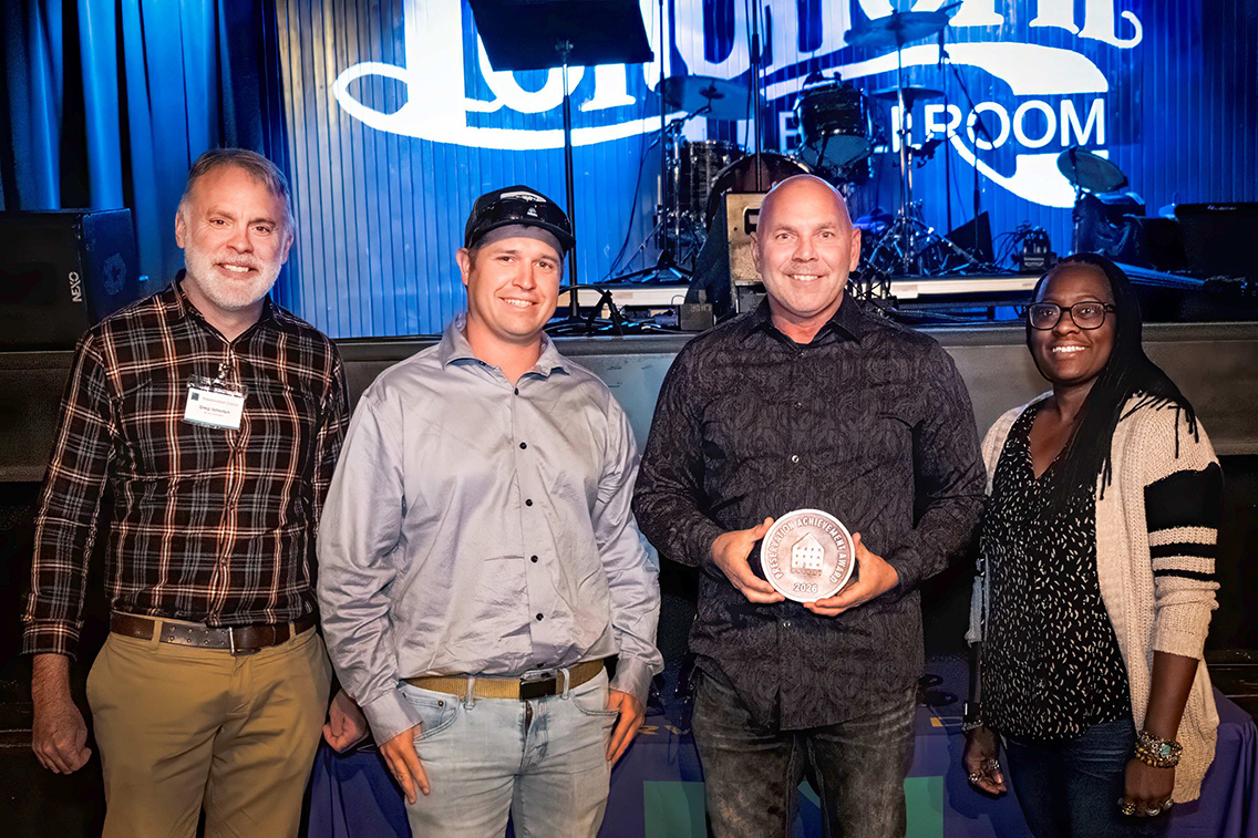 Treanor Historic Preservation Principal Greg Johnston with the Terminal Annex team at the 2026 Dallas Preservation awards.